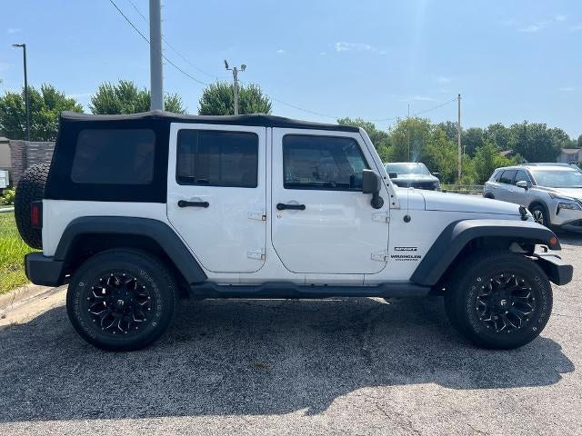 Used 2014 Jeep Wrangler Unlimited Sport with VIN 1C4HJWDG4EL320020 for sale in Kansas City